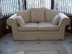 Two seater sofa Cream cotton material sofa with three....